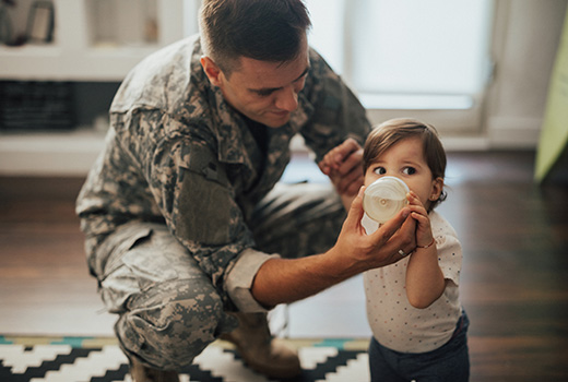 Military man and young child